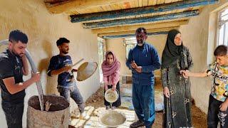 Nomadic life: nomadic couple: plastering and working on the roof of a nomadic house