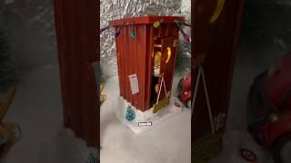 2 - Big Lots Animated Christmas Outhouse with pop out Santa Claus “Dashing through the snow” 2024