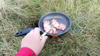 Wild camp cooking bacon on esbit stove