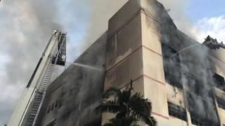 SCDF personnel at work at the C K Building fire