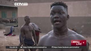 Many young men in Senegal seek fame and fortune through combat sport