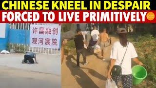 Chinese Head in Hands, Cry and Kneel Before Unfinished Buildings, Forced Into Primitive Living