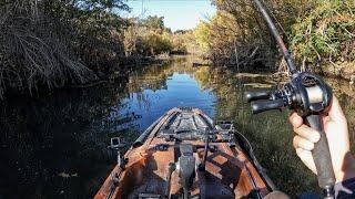 Fishing chilly backwaters in a small kayak