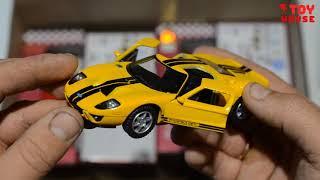 Box with diecast models of KINSMART cars unpacking and review. About cars.