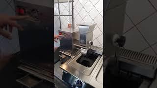Automatic falafel machine on a swivel stand