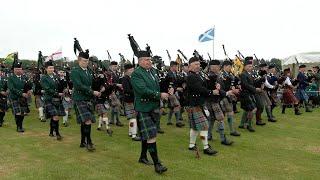 Farewell to the Creeks by Massed Pipe Bands during morning march at 2023 Gordon Castle Games