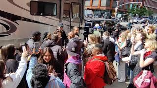 Timothee Chalamet take selfies with fans while filming a Chanel commercial in New York City