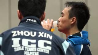 Jeff Huang and Timothy Wang get mid-match coaching during Men's Singles Table Tennis Final