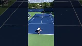 Mate Pavic at the baseline and Marin Cilic at the net