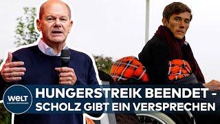 BERLIN: Die zwei verbliebenen Aktivisten beenden Hungerstreik - Olaf Scholz gibt ein Versprechen