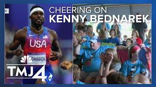 Supporters cheer on Rice Lake's Kenny Bednarek during 200m track final