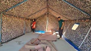 In the heart of nomadic life: Amir's school and the load of Asghar wood boards and roof construction