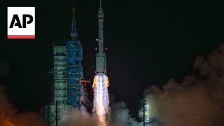 China launches new crew to its orbiting space station