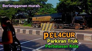 Jasa Tempat isi ulang Senam Jambu Mente dan Wanita penjual Jajanan murah Parkiran Truck istirahat.