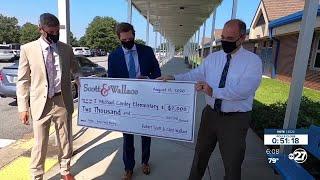 Conley Elementary's food pantry receives $2,000 donation from Scott & Wallace law firm