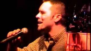 Josh Phelps sings at Kentucky Opry