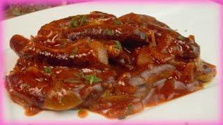 Fried sausage with onion sauce, simply made quickly and deliciously, bratwurst with sauce