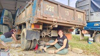 Girl repairs and restores old trucks abandoned long ago.