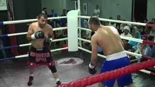 Ahmed Swedy: blue short vs Mahmoud Sharaf: black/red short