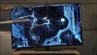 Guy Smashes 49" Smart TV with Baseball Bat