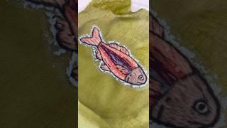 Washing stick and stitch paper to reveal fish embroidery #handbroidery #diy #bagcharm