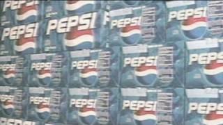 Pepsi cuts jobs, boosts marketing chasing Coke