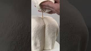 Hyperrealistic Cake on a Bed?