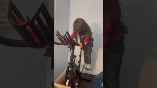 Inez Exercising on the Stationary Bicycle