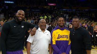 LeBron and Bronny James share a moment with Ken Griffey Sr and Jr before first game together