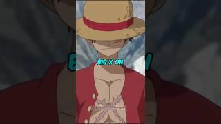 How did Luffy get the big X-shaped scar on his chest in One Piece?