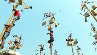 Indonesia celebrates Independence Day with greasy pole contest | AFP