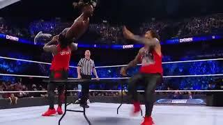 The Usos 1D Kofi Kingston through table