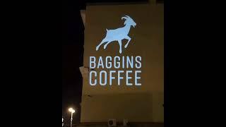 Baggins Coffee projecting their White transparent Logo