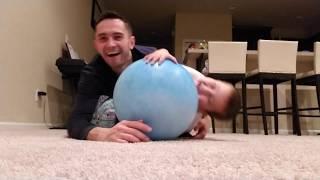 Eric Lendel and dad Bogdan Lendel playing with blue ball