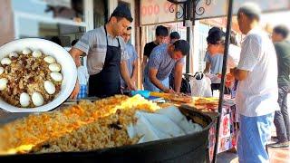 Delicious pilaf in two pots on the main road