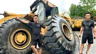 Auto repair: how a talented mechanic changes the tire of a giant 30-ton excavator