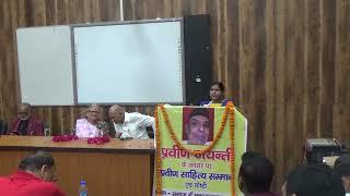 Dr Daya Dixit introducing dignitaries and Pravin Shodh Sansthan