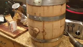 Waxing a leaky oak barrel