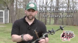 Ethics Achery Demonstrating Spinning Insert with Turkey Broadhead