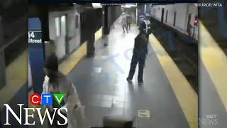 Woman survives being pushed in front of NYC subway train