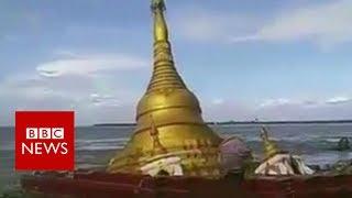 Dramatic footage shows pagoda collapsing into river - BBC News