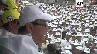 Opposition leader Sam Rainsy addresses election rally ahead of the July 28 vote