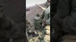  Mobilized fighters from Donbass and a captured Ukrainian Armed Forces tank with pixel camouflag