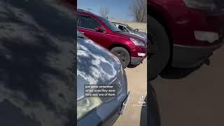 A Chevy 2500, 1987 Cadillac Coupe DeVille, Porsche Cayenne and some other junks at Auto Parts City