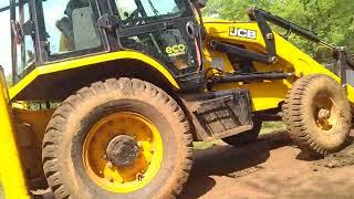 newJCB Backhoe Digging and Making Drain On The Side Of Road For Wall Construction - JCB Making Road