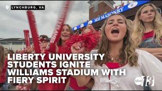 Liberty University fans ignite Williams Stadium with fiery spirit and funky hats