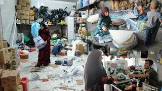 #nomadic: Baking local bread and cleaning the shop for wages by a nomadic woman