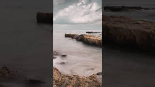 Serene Coastal Rocks Under a Cloudy Sky #sony #viltrox #viltrox16mm1.8 #sonya6700