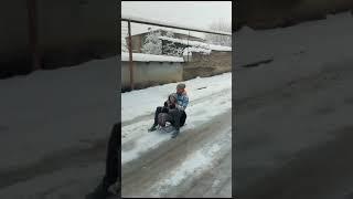 Зима в Кахетии. Давид катается на санках