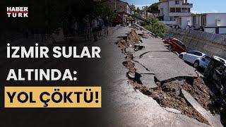 İzmir'de sel! Otomobil denize sürüklendi, istinat duvarı çöktü